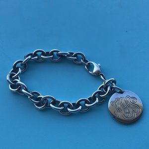 Tiffany & Co. Sterling silver round tag monogrammed charm bracelet